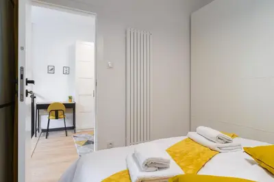 Łóżko lub łóżka w pokoju w obiekcie City Break P&O Apartments Olbrachta - Wola