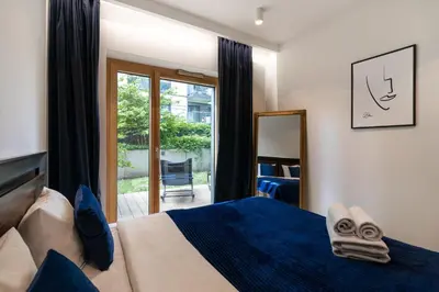 Łóżko lub łóżka w pokoju w obiekcie Urban Chic - Luxury 2-Bedroom, Mennica Residence