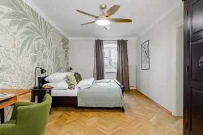Łóżko lub łóżka w pokoju w obiekcie Old Town Serviced P&O Apartments