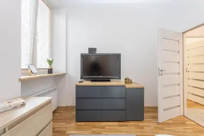 Telewizja i/lub zestaw kina domowego w obiekcie Golden Apartments - Big Luxury Apartment in Top Location - Wspólna