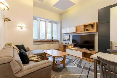 Telewizja i/lub zestaw kina domowego w obiekcie Golden Apartments - Big Luxury Apartment in Top Location - Wspólna