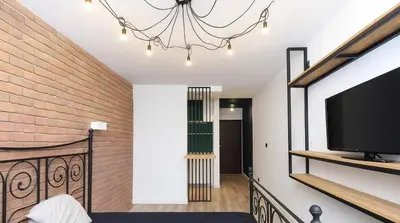 Telewizja i/lub zestaw kina domowego w obiekcie 133 Modern Warsaw Apartments