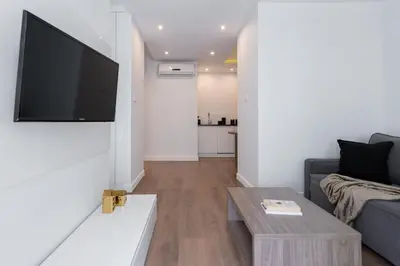 Telewizja i/lub zestaw kina domowego w obiekcie Urban Chic - Oxygen Residence - Wola - WroniaAB