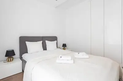 Łóżko lub łóżka w pokoju w obiekcie Urban Chic - Oxygen Residence - Wola - WroniaAB