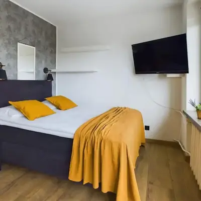 Bright Studio in Downtown Warsaw by Noclegi Renters
