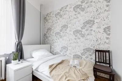 Łóżko lub łóżka w pokoju w obiekcie Apartament Plac Konstytucji