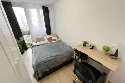 Łóżko lub łóżka w pokoju w obiekcie Rentel Hostel