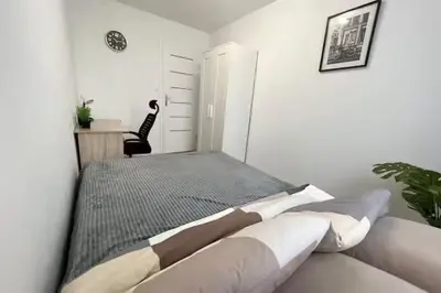 Łóżko lub łóżka w pokoju w obiekcie Rentel Home