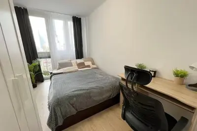 Łóżko lub łóżka w pokoju w obiekcie Rentel Home