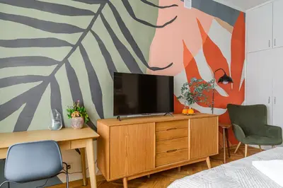 Telewizja i/lub zestaw kina domowego w obiekcie P&O Apartments- Cozy Studio Apartment in The City Centre