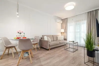 Część wypoczynkowa w obiekcie Close-Urban Chic - Luxury Stay for up to 10 Guests in Mennica Residence, Warsaw Center