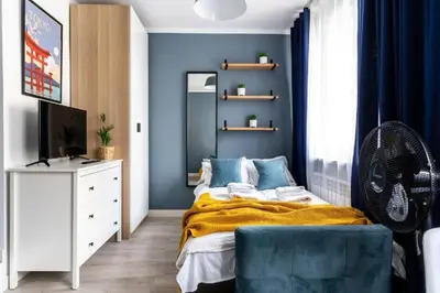 Łóżko lub łóżka w pokoju w obiekcie Close-Urban Chic -3 Bedrooms - Warsaw Stays - Ogrodowa