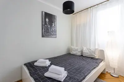Łóżko lub łóżka w pokoju w obiekcie Urban Apartaments - Great Location - City Center - Żelazna