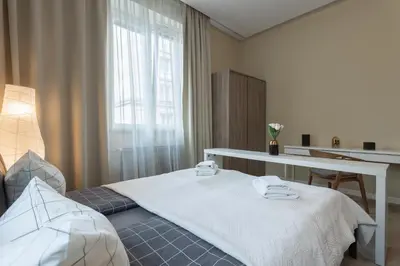 Łóżko lub łóżka w pokoju w obiekcie Urban Apartaments - Great Location - City Center - Konstytucji