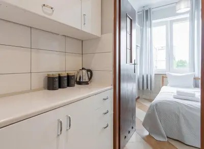 Łóżko lub łóżka w pokoju w obiekcie Urban Chic - Comfortable 2-Bedroom in City Center, Marszałkowska