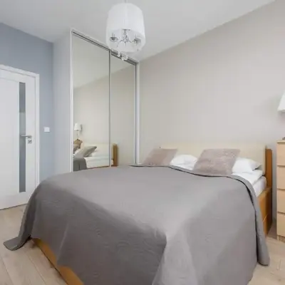 Cozy Apartment for 8 People with Air Conditioning and 2 Parking Spaces by Noclegi Renters