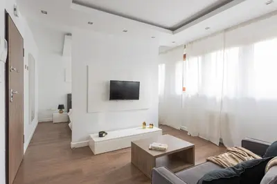 Telewizja i/lub zestaw kina domowego w obiekcie Close-Urban Apartaments - Great Location - City Center - Wronia В