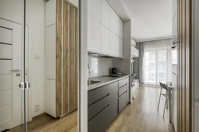 Kuchnia lub aneks kuchenny w obiekcie Klimatyzowane Apartamenty Studio Mennica Residence