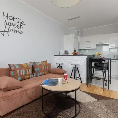 Unique Apartment with Balcony in Warsaw by Noclegi Renters