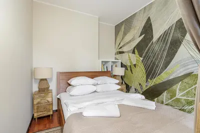 Łóżko lub łóżka w pokoju w obiekcie Dworzec Gdanski P&O Apartments