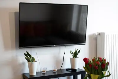 Telewizja i/lub zestaw kina domowego w obiekcie Mokotow
