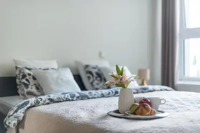 Łóżko lub łóżka w pokoju w obiekcie P&O Apartments Zawiszy