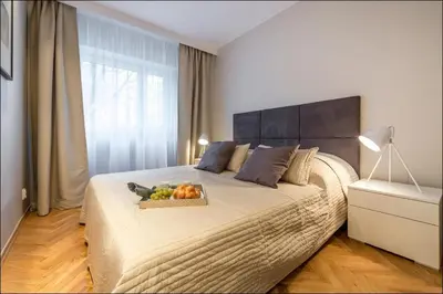 Łóżko lub łóżka w pokoju w obiekcie Chmielna Warsaw Cental Station P&O Serviced Apartments