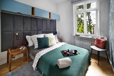 Łóżko lub łóżka w pokoju w obiekcie OCHOTA P&O Serviced Apartments