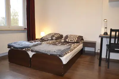 Łóżko lub łóżka w pokoju w obiekcie Warszawa Stare Bielany