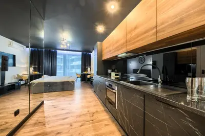 Kuchnia lub aneks kuchenny w obiekcie Kazou Residence Arkadia