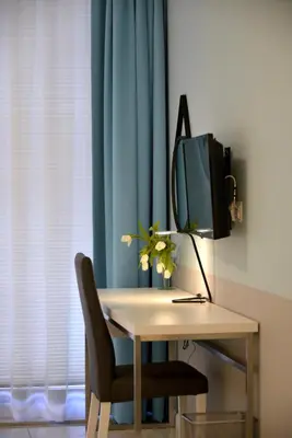 Telewizja i/lub zestaw kina domowego w obiekcie JessApart – Ochota Apartments