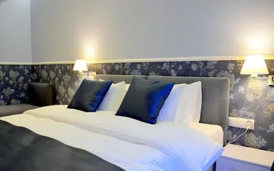 Łóżko lub łóżka w pokoju w obiekcie JessApart – Ochota Apartments