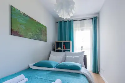 Łóżko lub łóżka w pokoju w obiekcie Wagonowa P&O Apartments
