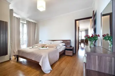 Łóżko lub łóżka w pokoju w obiekcie P&O Serviced Apartments Bukowinska