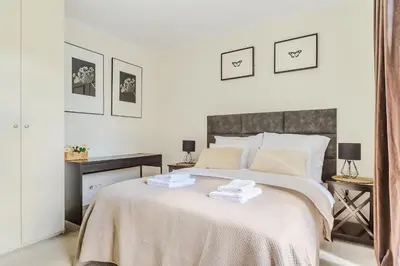 Łóżko lub łóżka w pokoju w obiekcie Zygmunta Slominskiego 5 - P&O Apartments