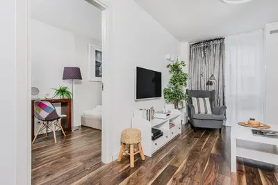 Telewizja i/lub zestaw kina domowego w obiekcie Grzybowska 5 by P&O Serviced Apartments