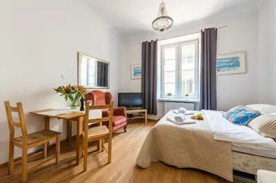 Łóżko lub łóżka w pokoju w obiekcie MIODOWA Street P&O Serviced Apartments