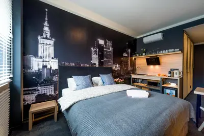 Łóżko lub łóżka w pokoju w obiekcie Beloved Warsaw Apartments - City Centre