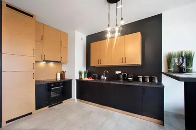 Kuchnia lub aneks kuchenny w obiekcie Cybernetyki 6b Serviced Accommodation