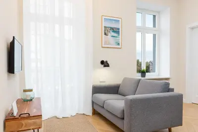 Telewizja i/lub zestaw kina domowego w obiekcie Apartments Warsaw Targowa by Noclegi Renters