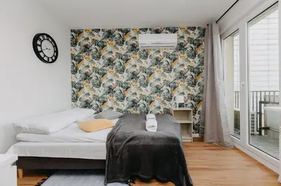 Łóżko lub łóżka w pokoju w obiekcie ShortStayPoland Pańska