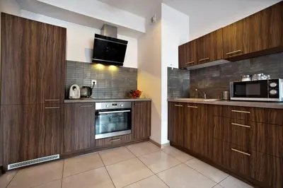 Kuchnia lub aneks kuchenny w obiekcie Airport Okecie Klobucka P&O Serviced Apartments