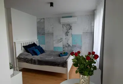 Łóżko lub łóżka w pokoju w obiekcie Apartament Kuba