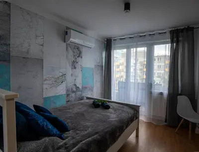 Łóżko lub łóżka w pokoju w obiekcie Apartament Kuba