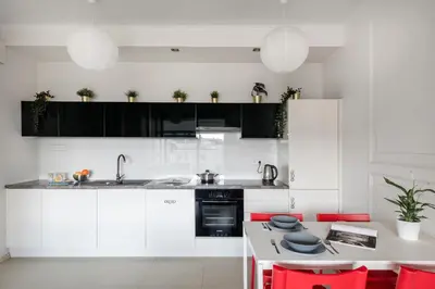 Kuchnia lub aneks kuchenny w obiekcie Waw - Apartamenty Wilanów II Sarmacka