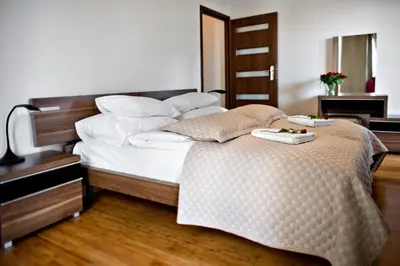 Łóżko lub łóżka w pokoju w obiekcie 2 bedrooms Bukowinska P&O Serviced Apartments