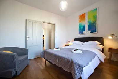 Łóżko lub łóżka w pokoju w obiekcie Zoliborz P&O Serviced Apartments
