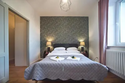 Łóżko lub łóżka w pokoju w obiekcie Zoliborz P&O Serviced Apartments