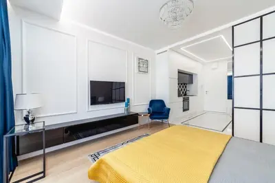 Telewizja i/lub zestaw kina domowego w obiekcie Luksusowy apartament Centrum Warszawy z tarasem
