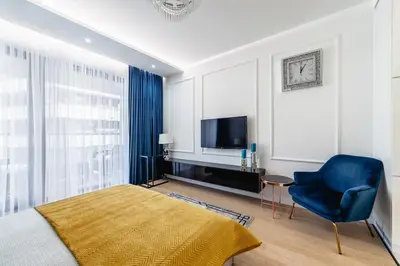 Telewizja i/lub zestaw kina domowego w obiekcie Luksusowy apartament z tarasem Centrum Warszawy